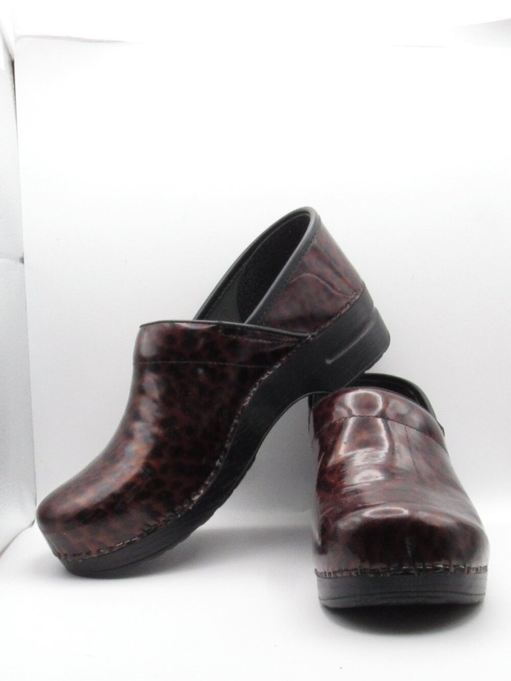 Dansko Black and Orange Leopard Print Glossy Clogs Size 42 EU; 11-11.5 US